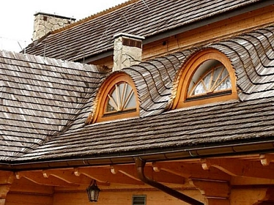 Дома из бруса под усадку: выбор кровельного материала